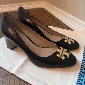 Beautiful black Tory Burch heels with gold logo.  Very sophisticated size 10.